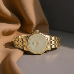 Titan Karishma Quartz Analog Champagne Round Dial Golden Stainless Steel Strap Watch for Women - NT2593YM01