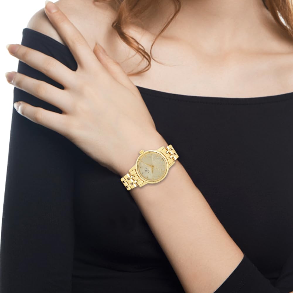Titan Karishma Quartz Analog Champagne Round Dial Golden Stainless Steel Strap Watch for Women - NT2593YM01